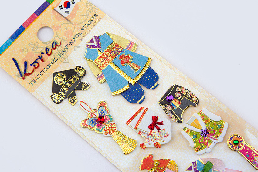 [텍스트: Korea TRADITIONAL HANDMADE STICKER MADE IN KOREA] 한복과 전통 노리개, 속옷을 형상화한 입체 스티커, 금박 디테일과 꽃문양, 오방색 조합의 화려한 장식 표현