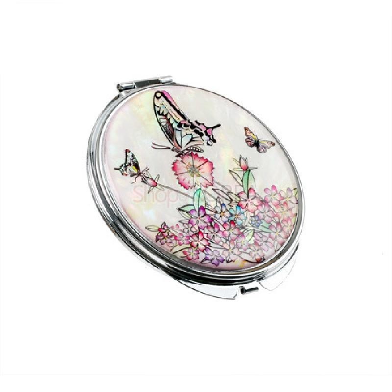 자개로 장식된 원형 손거울, 흰 자개 바탕에 나비와 꽃 문양을 섬세한 채색과 상감 기법으로 표현한 디자인