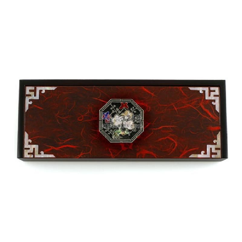 붉은색 한지 배경 위 자개 운학 문양과 금속 테두리 장식, 모서리 금속 기하학 무늬가 있는 직사각형 자동함.