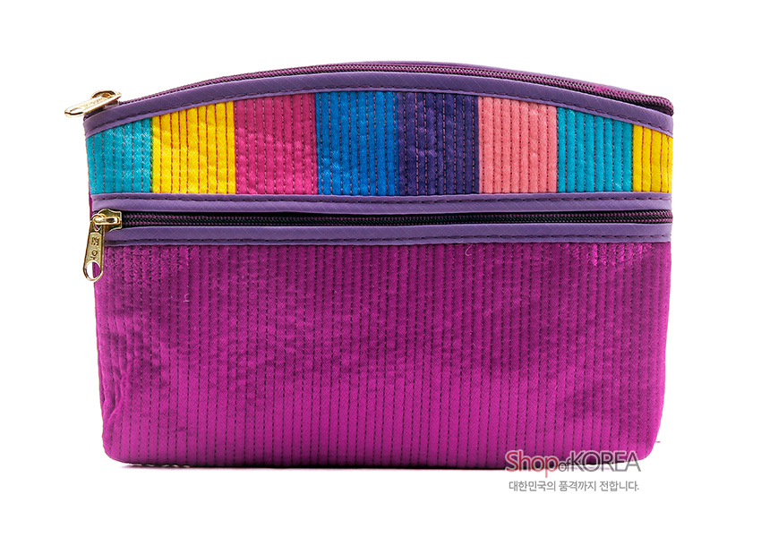 [텍스트: Shop of KOREA 대한민국의 품격까지 전합니다.] 보라색 누비 원단에 노랑·분홍·파랑·청록 색동 패치와 금속 지퍼 장식이 더해진 직사각형 티슈 지갑 디자인