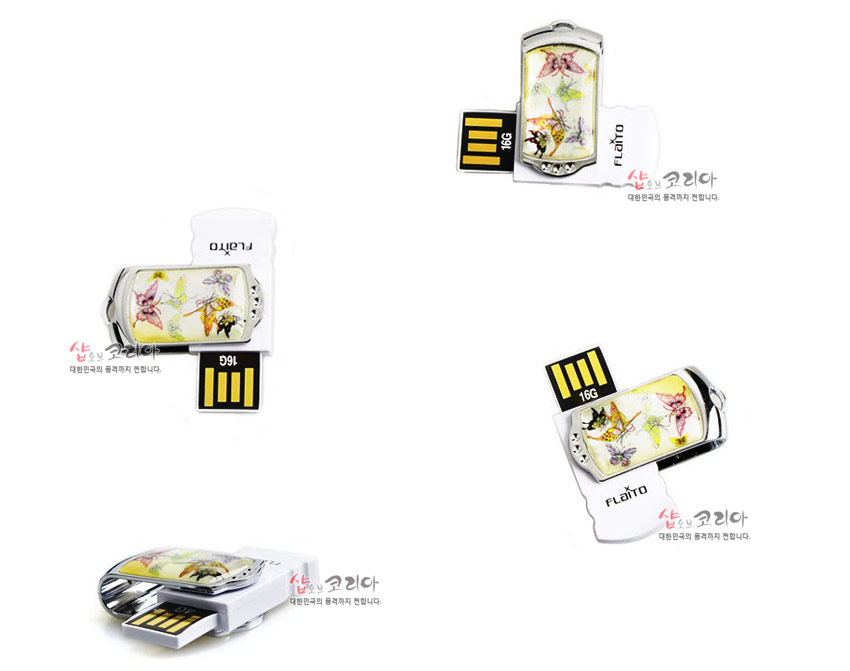 [텍스트: FLATTO, 16G, 샵오브코리아 대한민국의 문화를 전합니다.] 금속 테두리에 자개 상감 기법으로 표현된 다채로운 나비와 꽃 문양, 은백색과 파스텔 색조가 어우러진 스윙형 USB 메모리 디자인