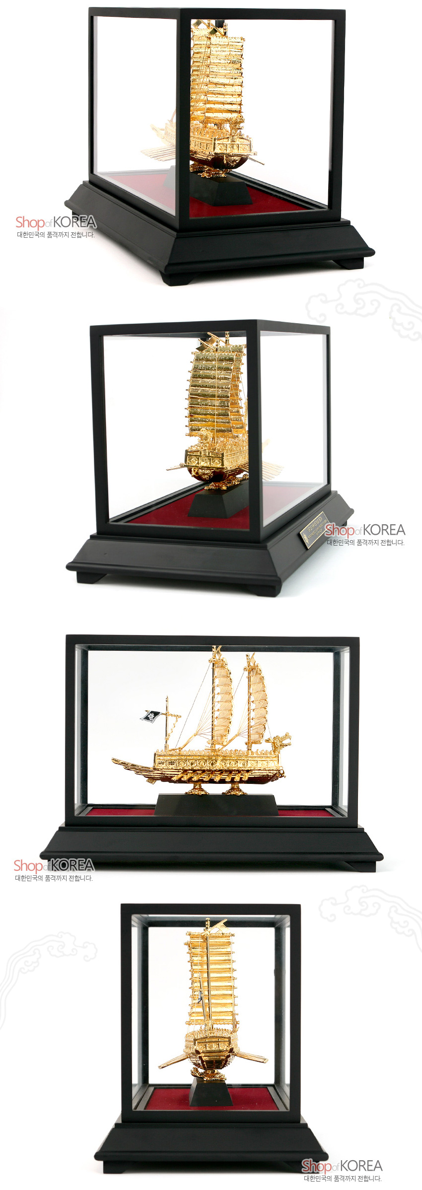 [텍스트: ShopofKOREA 대한민국의 품격까지 전합니다.] 투명 유리 케이스와 검은 목재 받침 위에 올려진 24K 금속 재질 거북선 모형, 세밀한 용두·돛·노 조각과 붉은 천 바닥 장식이 돋보이는 구성