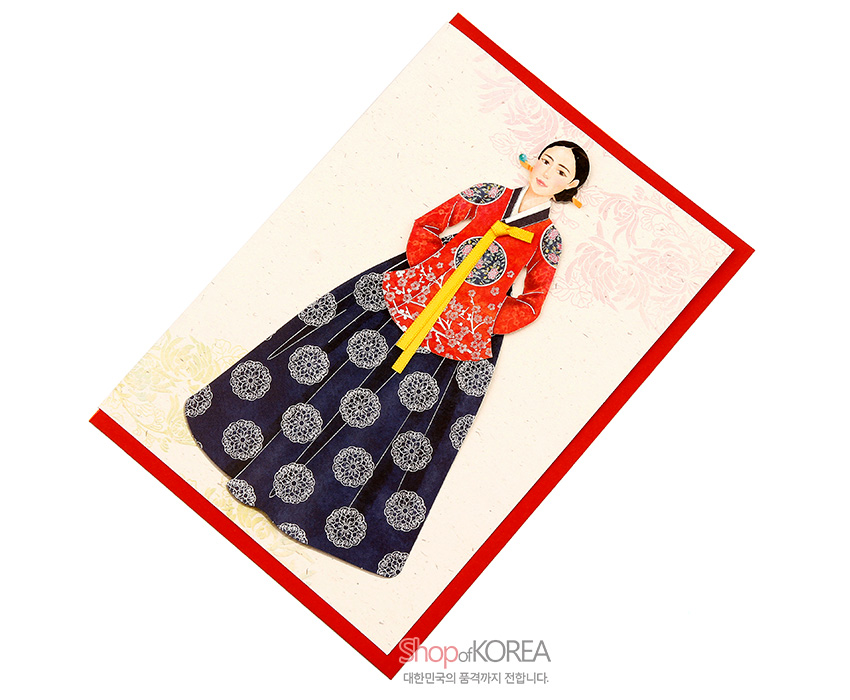 [텍스트: shopofKOREA 대한민국의 품격까지 전합니다.] 붉은색 배경 위 전통 한복 입은 공주 일러스트 카드, 남색 치마의 원형 꽃문양과 노랑 고름, 은은한 배경 꽃문양이 돋보이는 디자인
