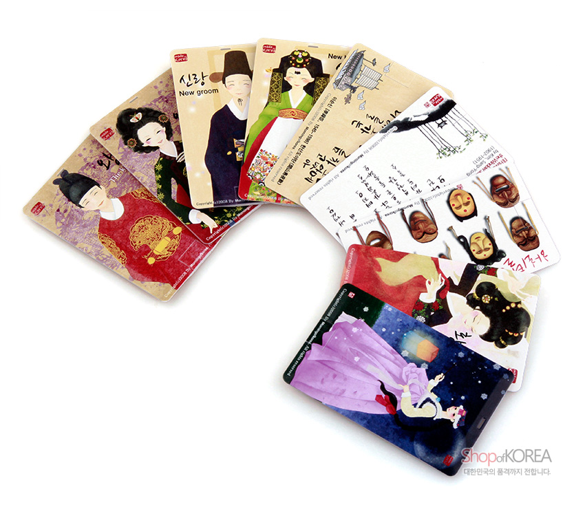 [텍스트: 신랑 New groom, Shop of KOREA 대한민국의 품격까지 전합니다.] 전통 혼례 한복과 탈, 한글 필체를 감각적 일러스트로 표현한 카드형 USB 디자인, 붉은색·보라색·녹색 대비 색감과 꽃·문조 문양 장식 모습