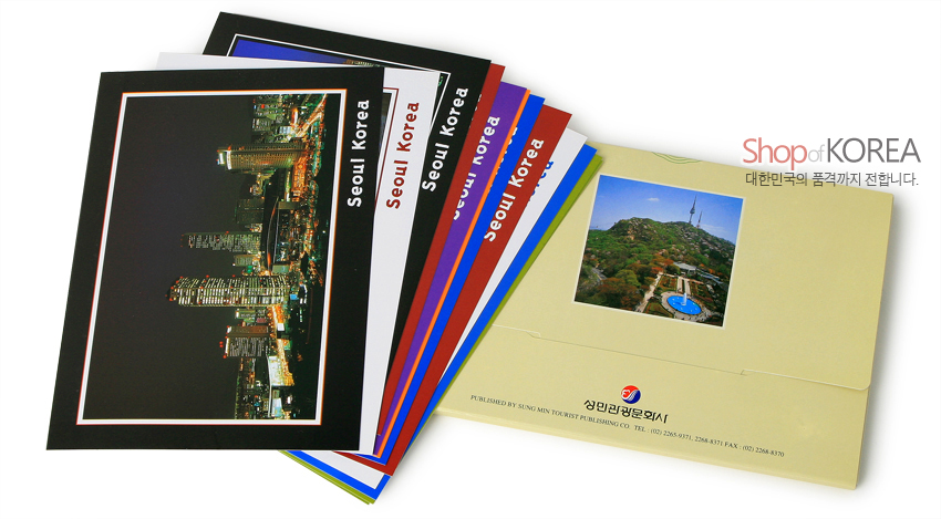 [텍스트: Seoul Korea, Shop of KOREA, 대한민국의 품격까지 전합니다., 성민미디어] 서울 야경과 남산타워 풍경 사진이 인쇄된 광택 종이 재질 컬러 엽서 세트, 다양한 색상 테두리 구성의 직사각형 카드형 디자인