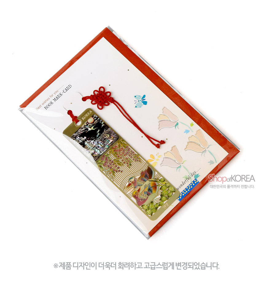 [텍스트: Best wishes for you… BOOK MARK·CARD / Shop of KOREA] 금속 바탕 위 자개 상감으로 표현된 밤하늘과 원앙, 꽃 문양, 붉은 전통 매듭 끈이 더해진 책갈피 카드 구성