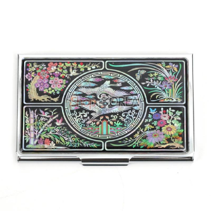 자개 상감 기법으로 학과 사군자, 화려한 꽃 문양을 장식한 흑색 바탕 금속 명함집.