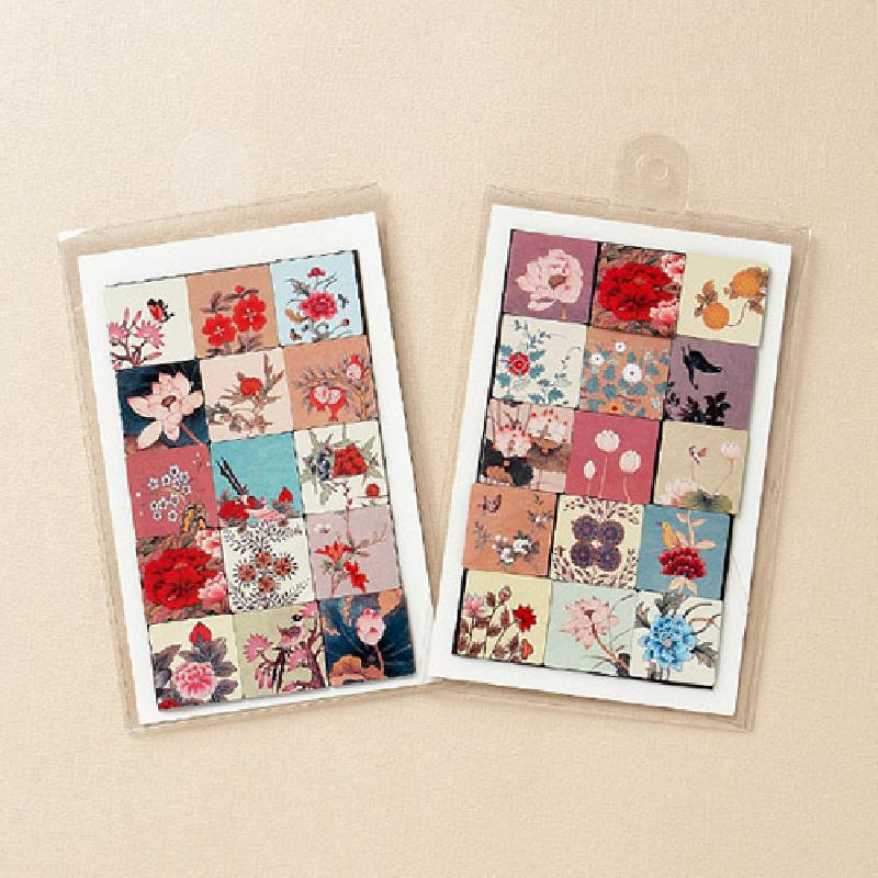 전통 민화 화조도 패턴을 모자이크 형태로 배열한 고무 재질 자석 세트, 다양한 꽃과 새 문양과 파스텔 색조가 어우러진 디자인.